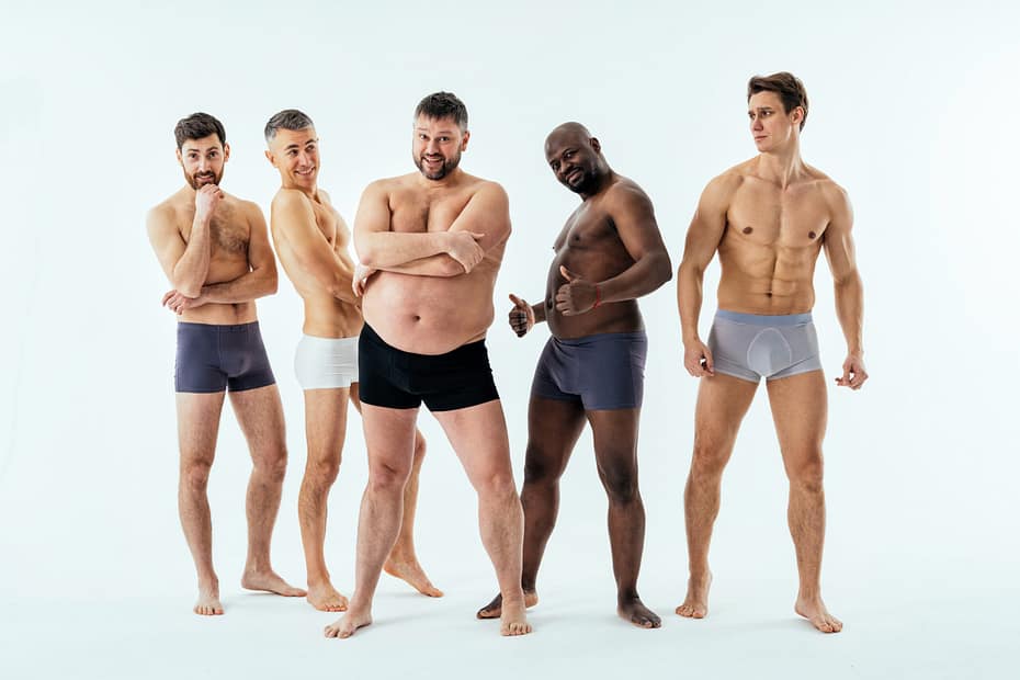 Group of men in their underwear showing their confidence in themselves. Swingers being confident.
